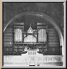 Orgel 1893, Friedrich Goll, Luzern, mech. Kegelladen, II/16. Die seitlichen Erweiterungen mit Holzgittern entsprechen dem Zustand von 1917.